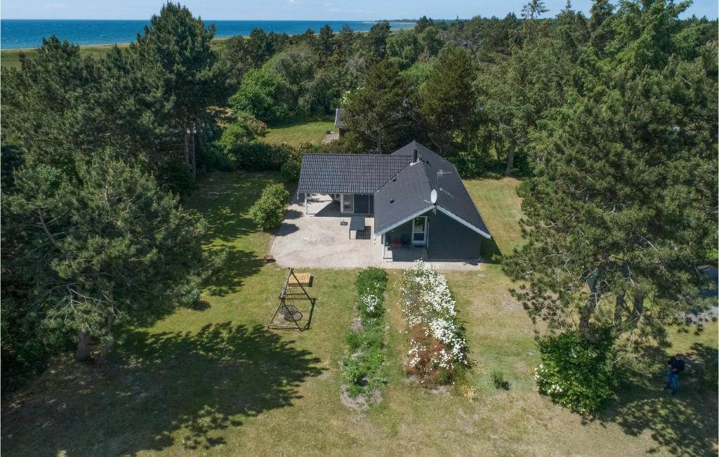 an overhead view of a house with a garden at Holiday Home Mågelunden Rødby Ii in Kramnitse