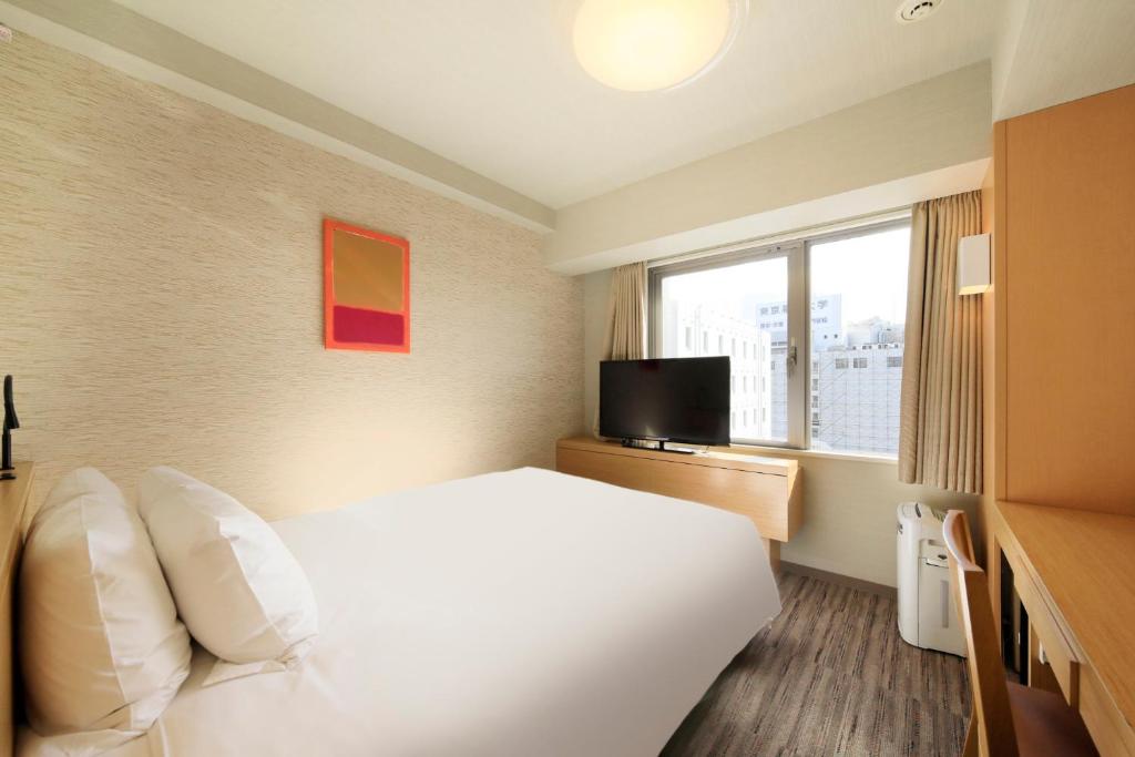 TV a/nebo společenská místnost v ubytování Richmond Hotel Nagoya Shinkansen-guchi