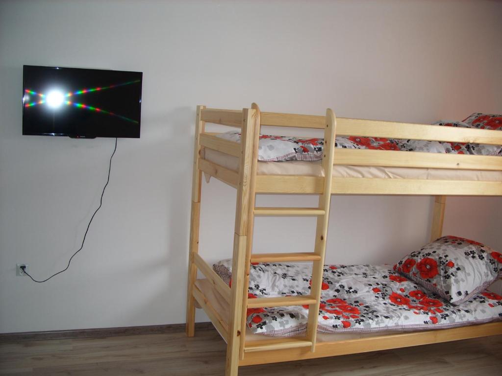 Postel nebo postele na pokoji v ubytování Pokoje Typu Studio Sosnowiec