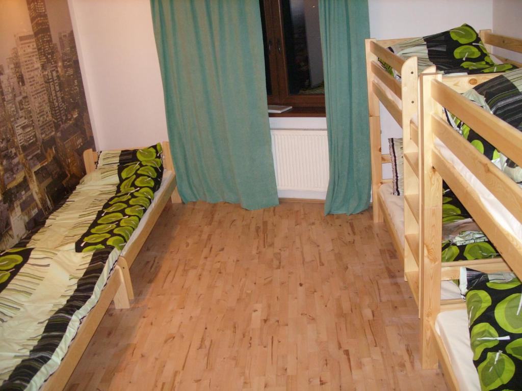 Postel nebo postele na pokoji v ubytování Pokoje Typu Studio Sosnowiec