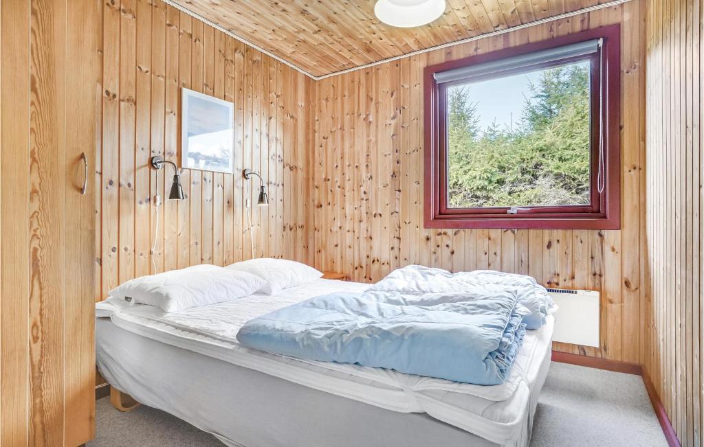 Postel nebo postele na pokoji v ubytování Holiday Home Fridavej Grenaa Xii