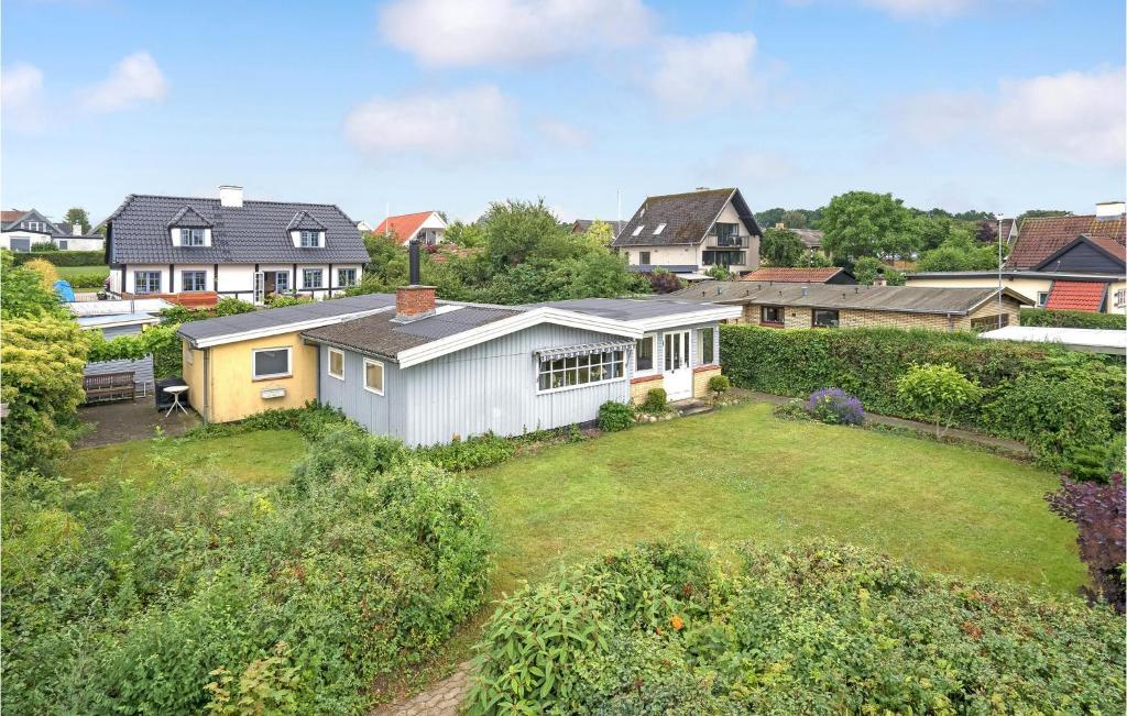 una vista aérea de una casa con patio en Gorgeous Home In Roskilde With Wifi en Roskilde