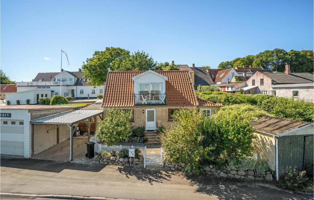 an aerial view of a house in a residential neighborhood at Cozy Home In Stubbekbing With Kitchen in Stubbekøbing