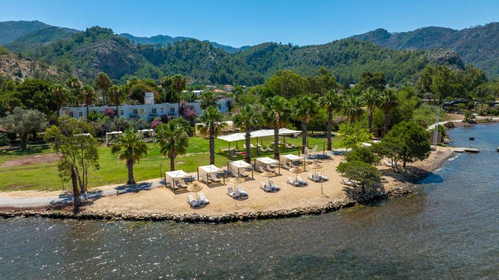 an aerial view of a resort on a island in the water at Chillos Beach in Marmaris