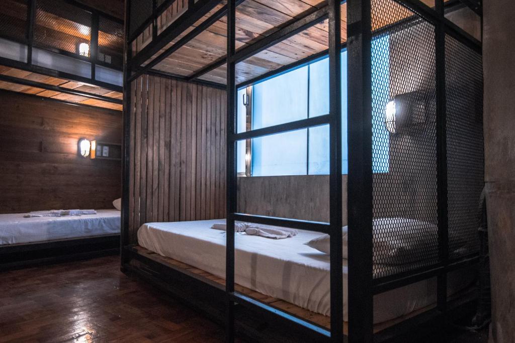 Postel nebo postele na pokoji v ubytování CONNECTOR Hostel