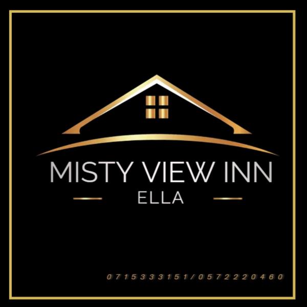 a logo of a house with the words misty view inn elka at Misty View Inn in Ella