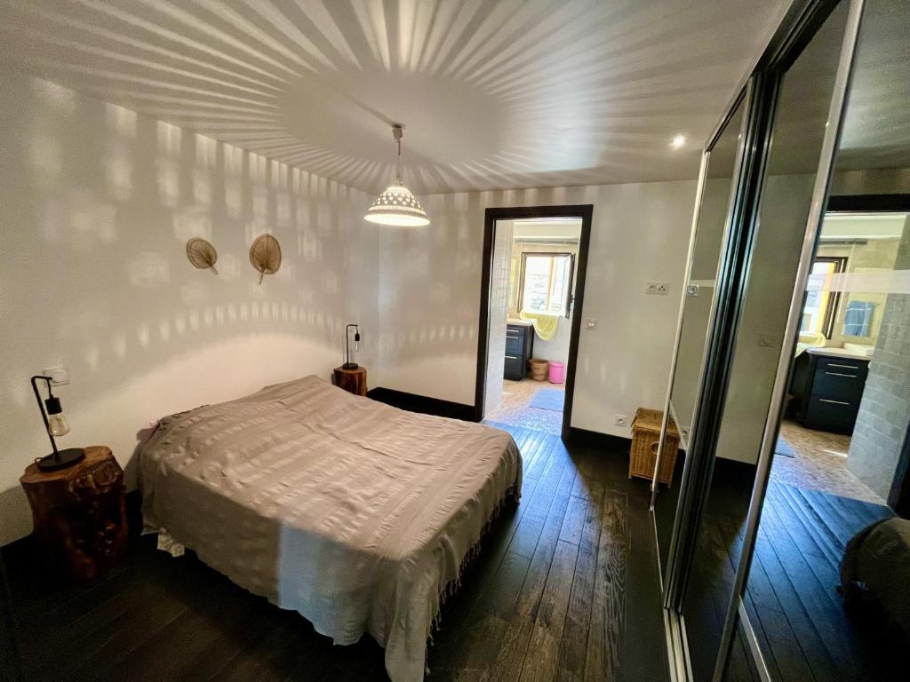 Posteľ alebo postele v izbe v ubytovaní Appartement 6 personnes, les 3 vallées, près des Thermes