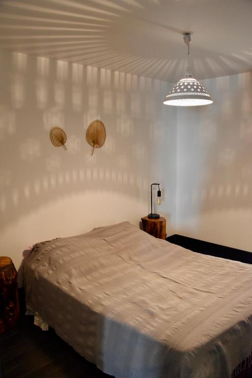 Posteľ alebo postele v izbe v ubytovaní Appartement 6 personnes, les 3 vallées, près des Thermes