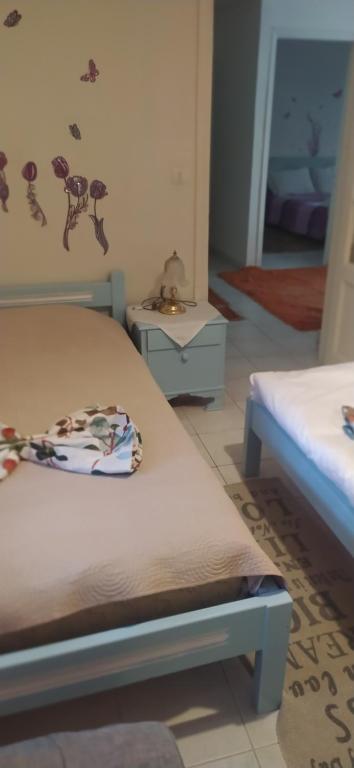 Postel nebo postele na pokoji v ubytování Cozy house 2