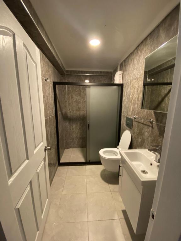 Ванная комната в Fethiye merkez çarşıda 1+1 daire