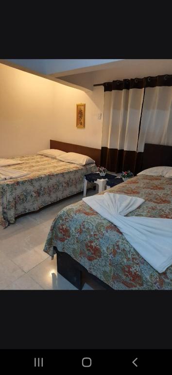 Postel nebo postele na pokoji v ubytování B&B KeisyAlba Punta Rucia