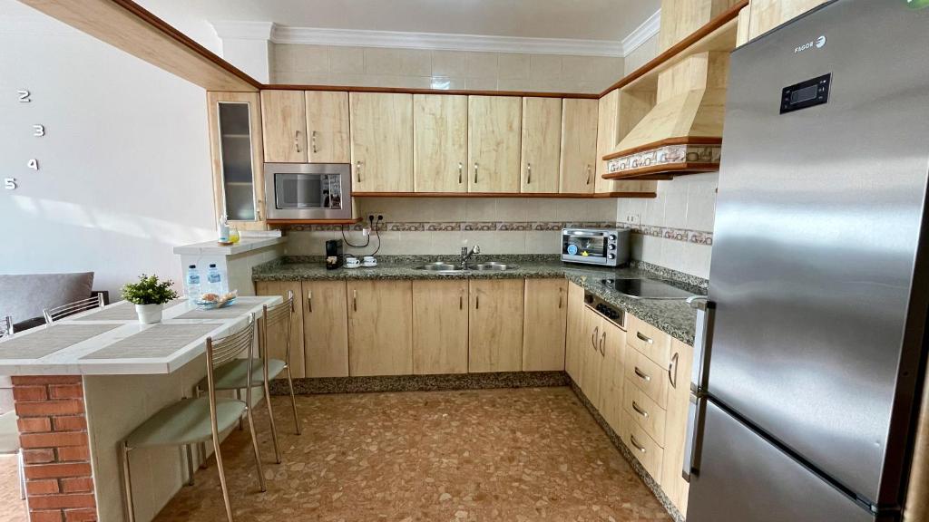 Kuchyňa alebo kuchynka v ubytovaní Palacio de Ferias apartamento