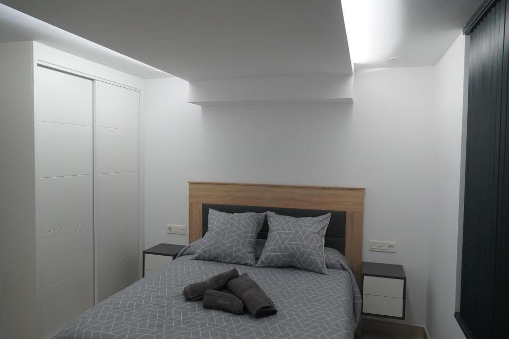 Postel nebo postele na pokoji v ubytování Apartamento Turistico Hermanos Infantes