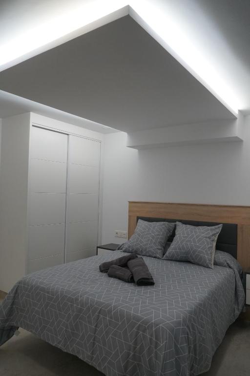 Postel nebo postele na pokoji v ubytování Apartamento Turistico Hermanos Infantes
