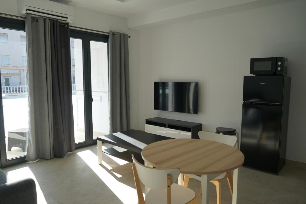 TV a/nebo společenská místnost v ubytování Apartamento Turistico Hermanos Infantes