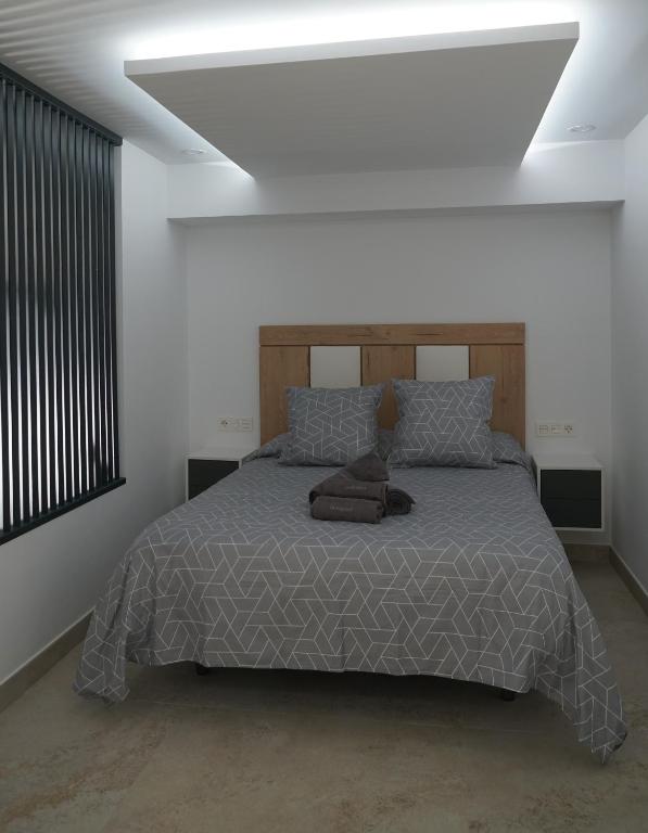 Postel nebo postele na pokoji v ubytování Apartamento Turistico Hermanos Infantes