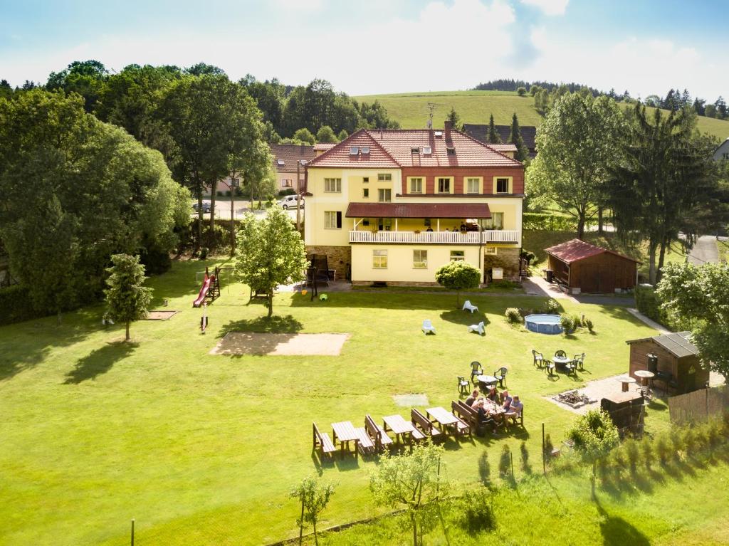 an aerial view of a large house in a field at penzion Horácko in Unčín