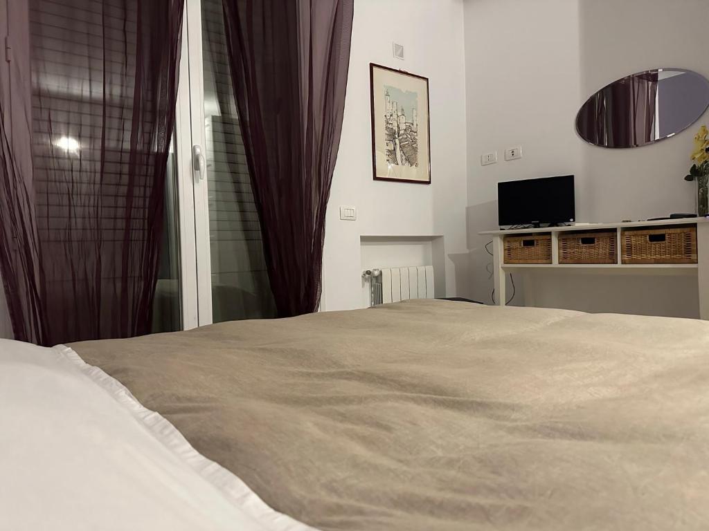 Łóżko lub łóżka w pokoju w obiekcie Malusi B&B