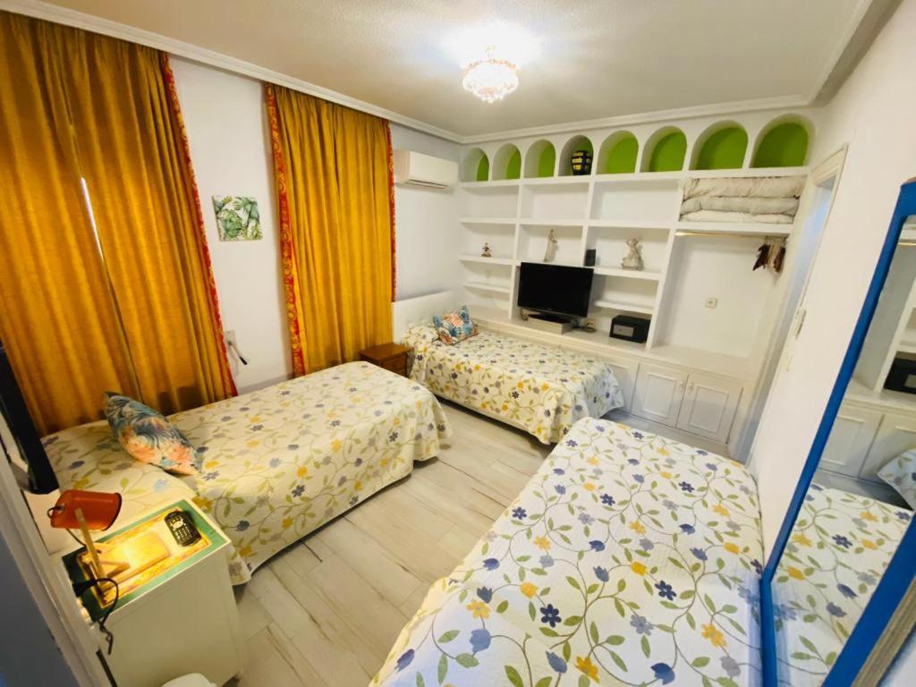 Letto o letti in una camera di Pensión Antonio Guesthouse