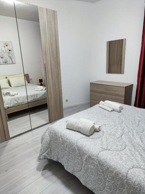 Posteľ alebo postele v izbe v ubytovaní Appartamento C&Y Torelli