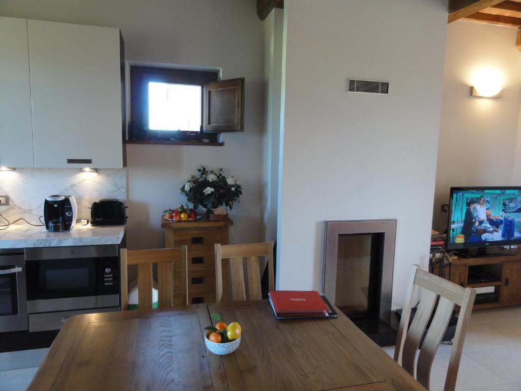 A television and/or entertainment centre at Podere Le Volpaie, Volterra, Tuscany