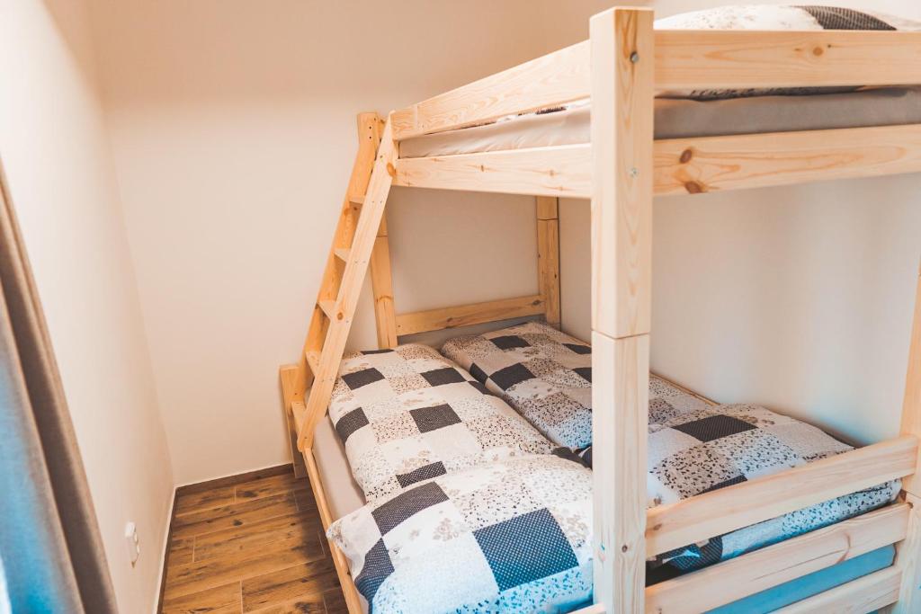 Postel nebo postele na pokoji v ubytování Chata Lipka