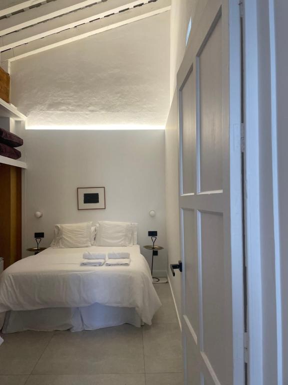 Postel nebo postele na pokoji v ubytování TRASCUESTA 10