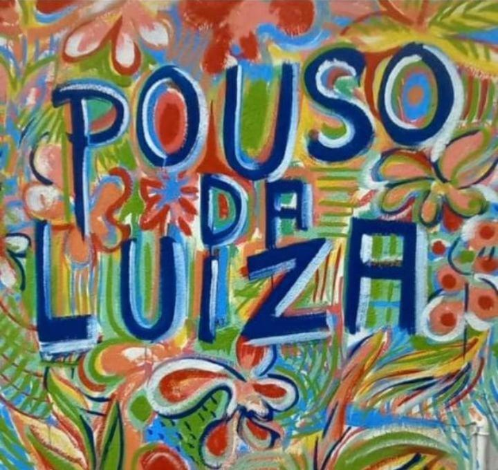 a painting of a sign with the words pulled up at Pouso da Luiza in Tiradentes