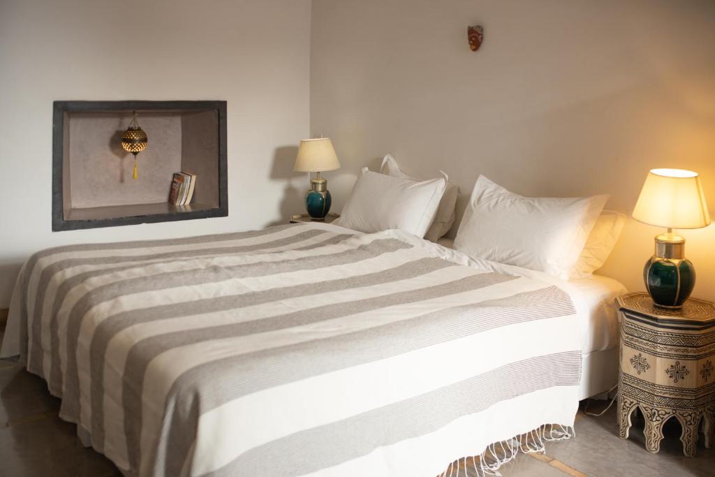 Letto o letti in una camera di Riad Alnadine