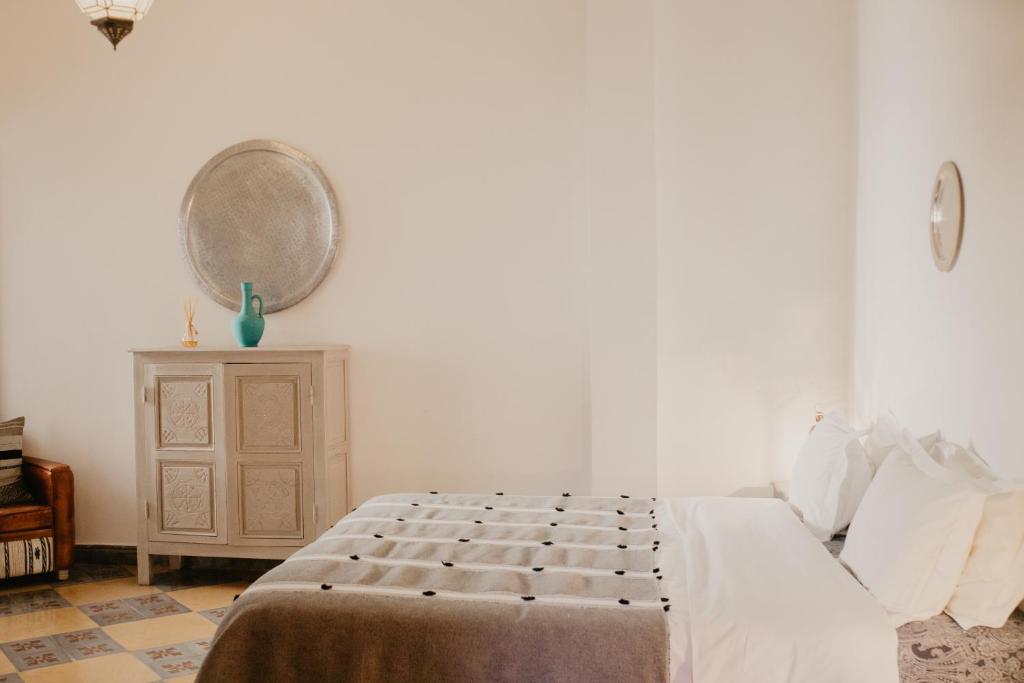 Letto o letti in una camera di Riad Alnadine