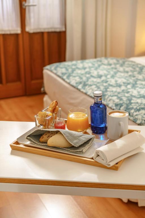 Postel nebo postele na pokoji v ubytování Hotel Boutique Párraga Siete