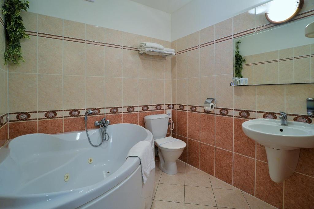 Koupelna v ubytování Hotelový resort Šikland