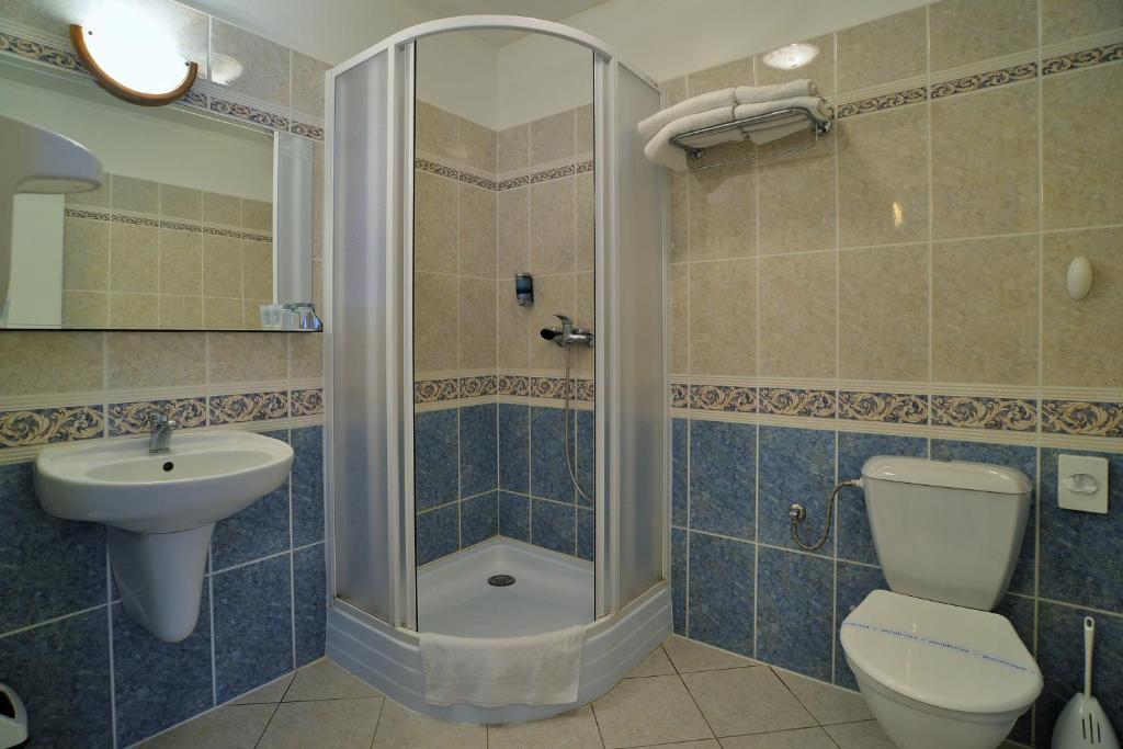 Koupelna v ubytování Hotelový resort Šikland