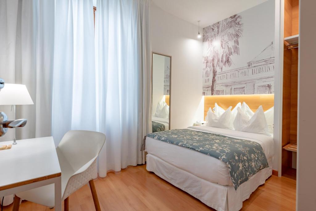 Postel nebo postele na pokoji v ubytování Hotel Boutique Párraga Siete