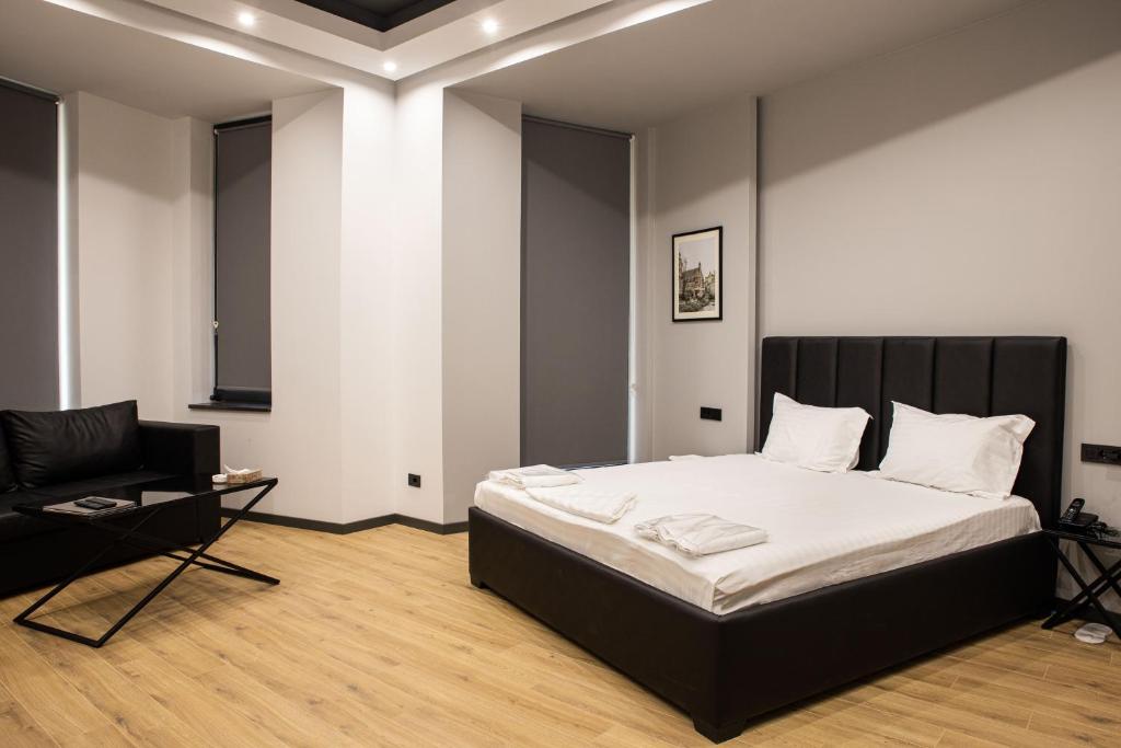 Postel nebo postele na pokoji v ubytování Hotel Elion