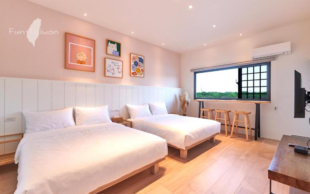 Postel nebo postele na pokoji v ubytování 好室一庒House in field宜蘭獨棟平房民宿 可包棟
