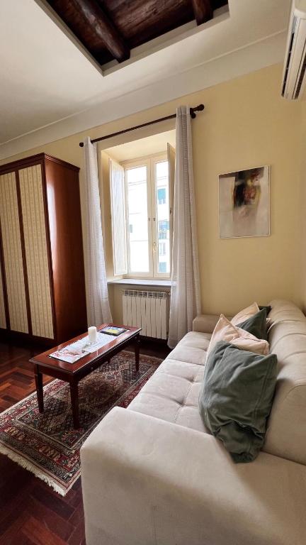 Łóżko lub łóżka w pokoju w obiekcie Calabritto Suite