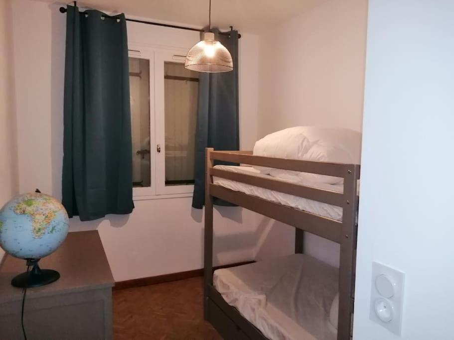 Posteľ alebo postele v izbe v ubytovaní Maison Gaillacoise