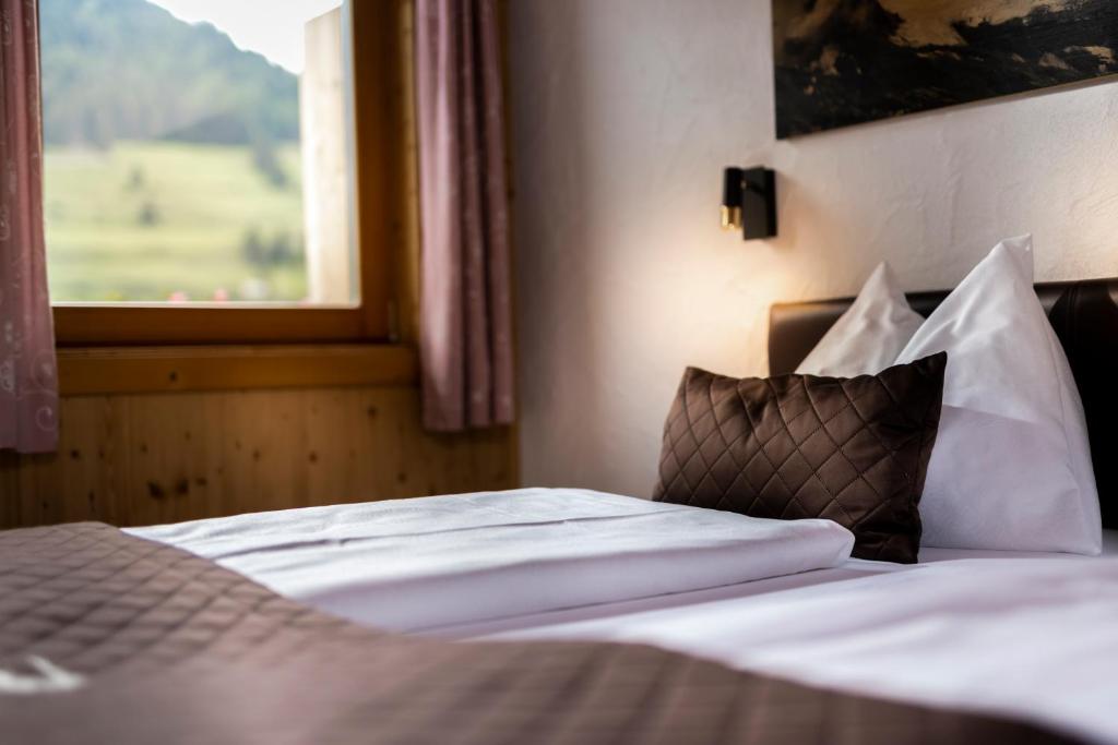 Una cama o camas en una habitación de Gamsalm