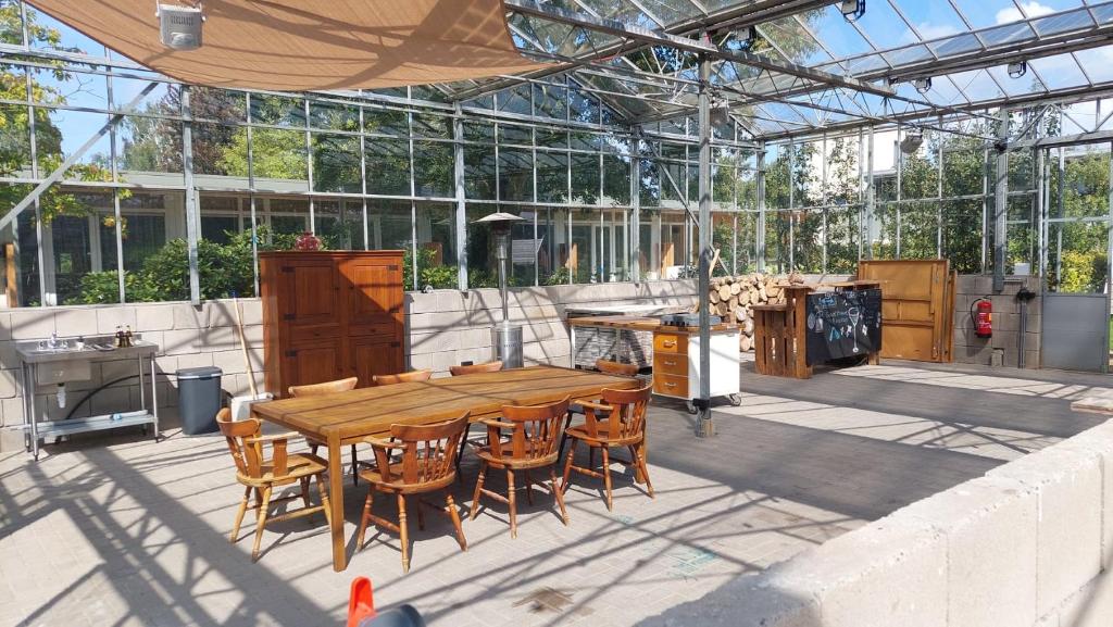 Restaurace v ubytování Achterhoeks Goed, Minicamping in Vragender