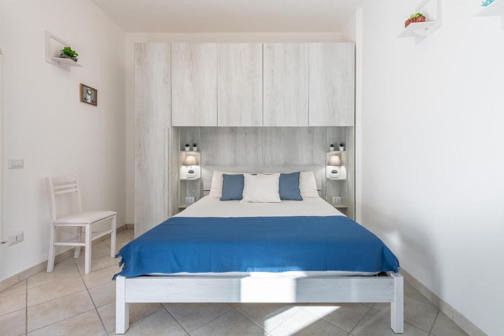 A bed or beds in a room at Casa Clà
