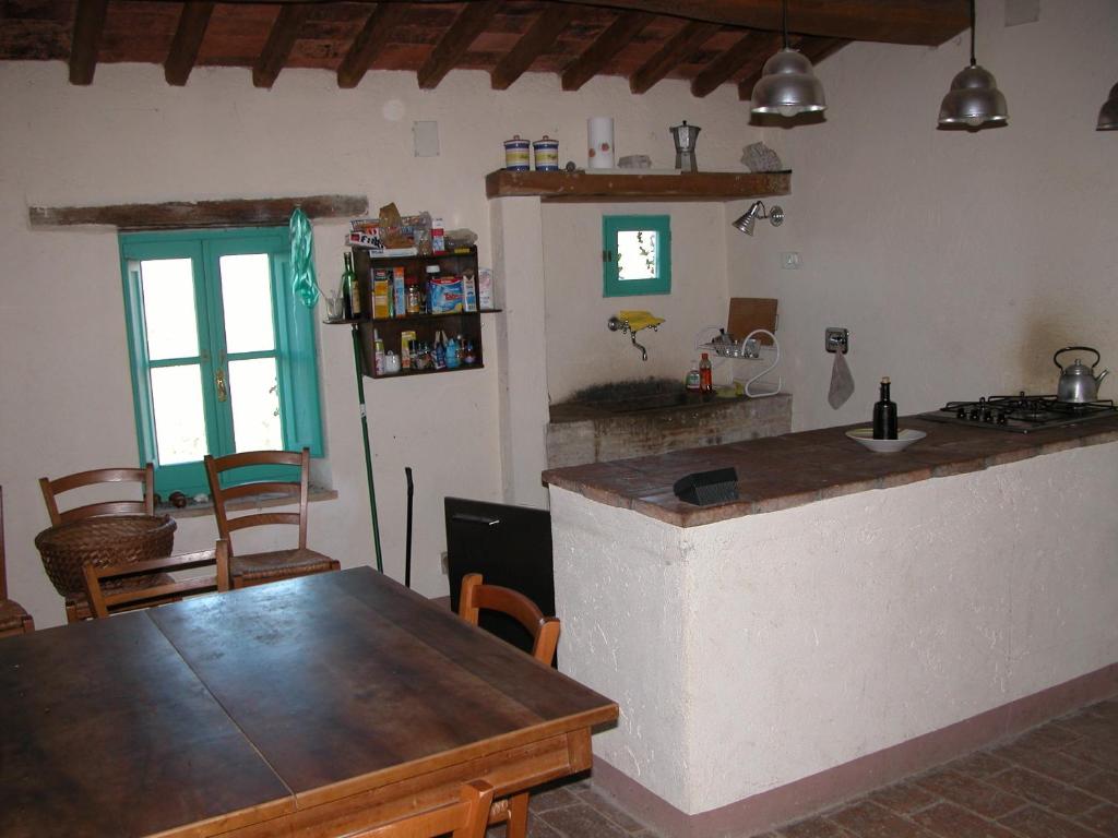 Kuchyň nebo kuchyňský kout v ubytování Castello di Mongiovino