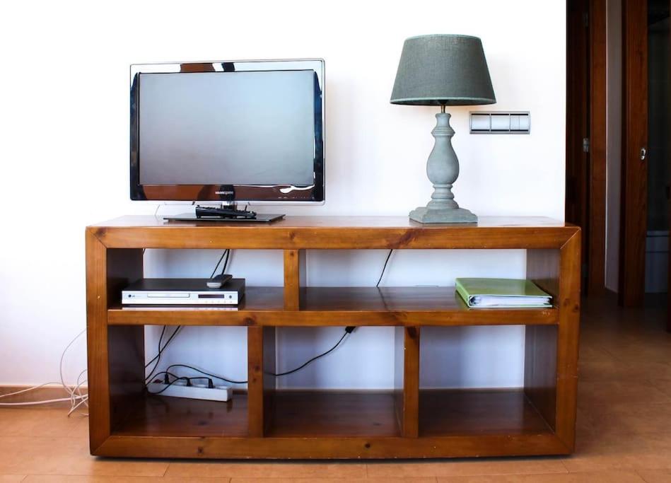 A television and/or entertainment centre at Apartamento Alcocebre Beach Resort