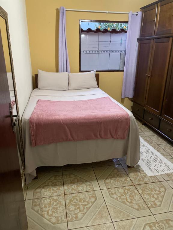 Katil atau katil-katil dalam bilik di Casa Temporada Paraty