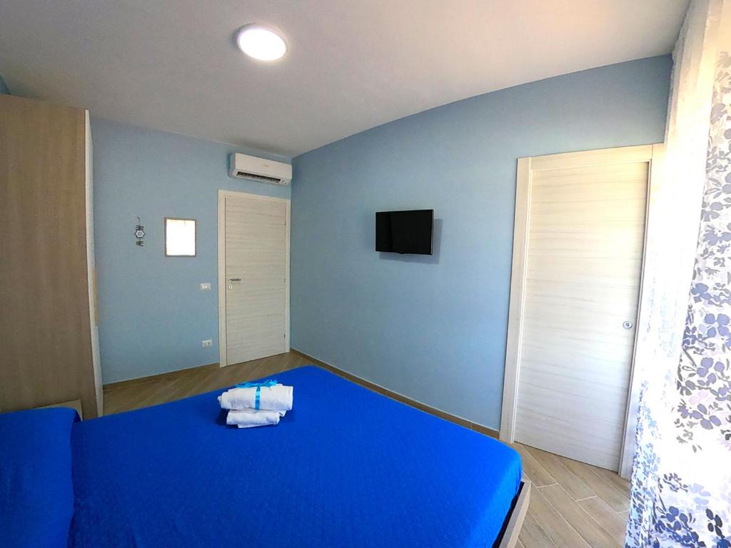 Postel nebo postele na pokoji v ubytování B&B Il Gioiello