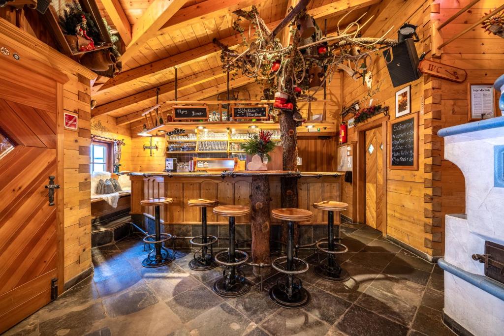 Lounge nebo bar v ubytování Hotel Breitlehenalm