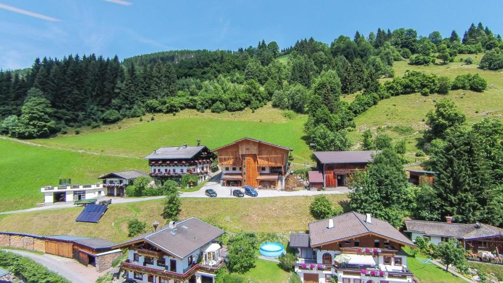 an aerial view of a house on a hill at Remberghof in Viehhofen