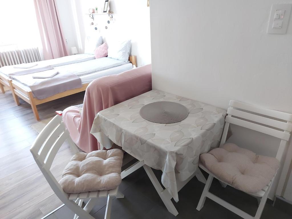 Postel nebo postele na pokoji v ubytování Scala Studio Apartments