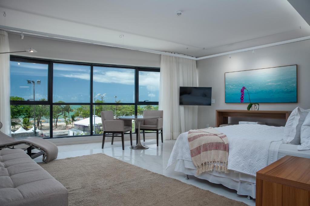 TV a/nebo společenská místnost v ubytování Meridiano Hotel