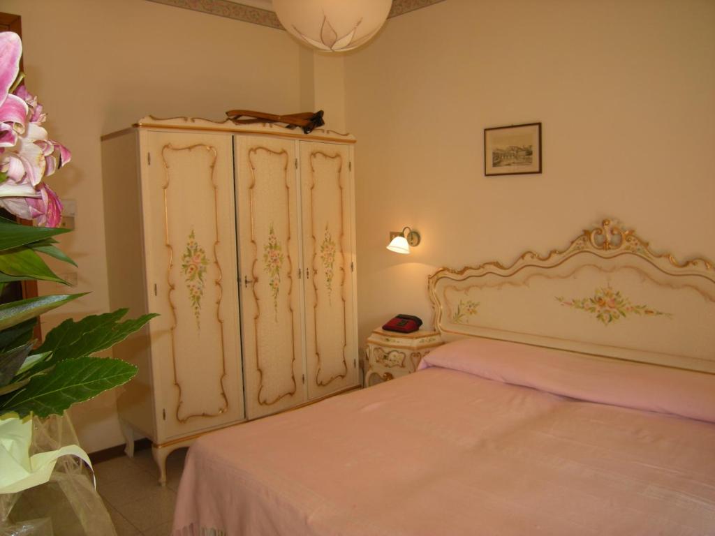 Posteľ alebo postele v izbe v ubytovaní Hotel Continental